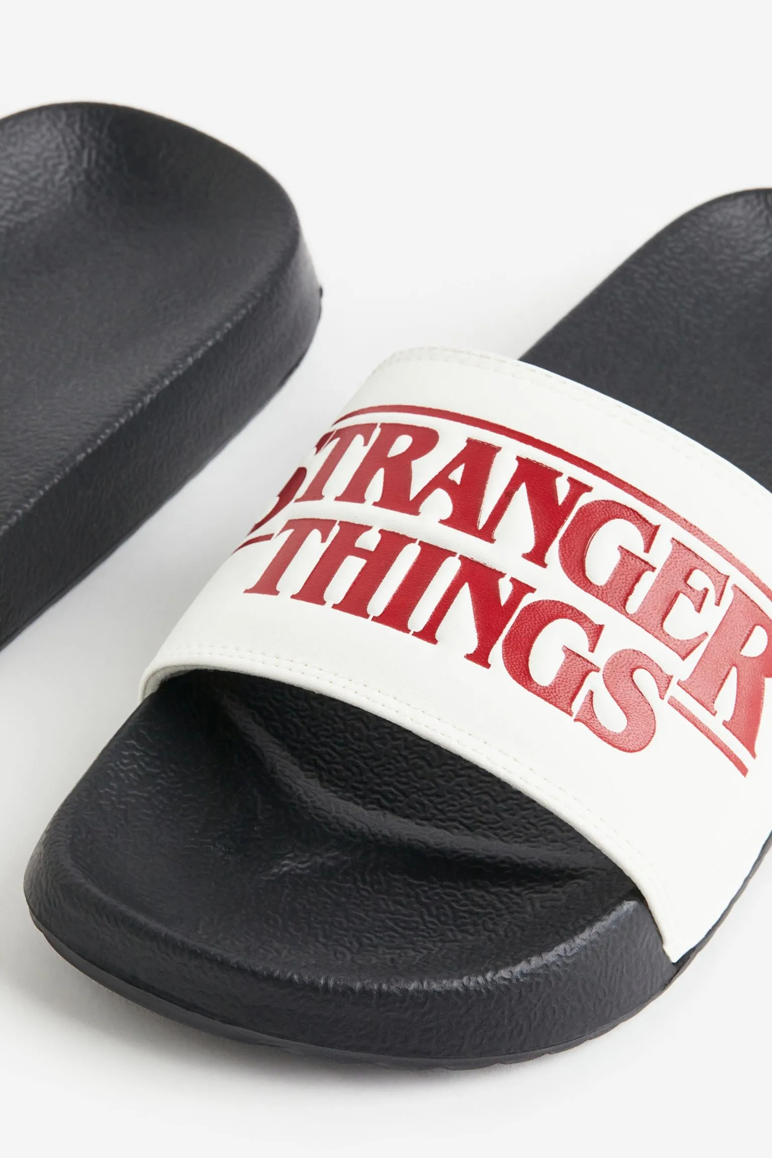 H&M Stranger Things Printed Pool Slippers, white/black